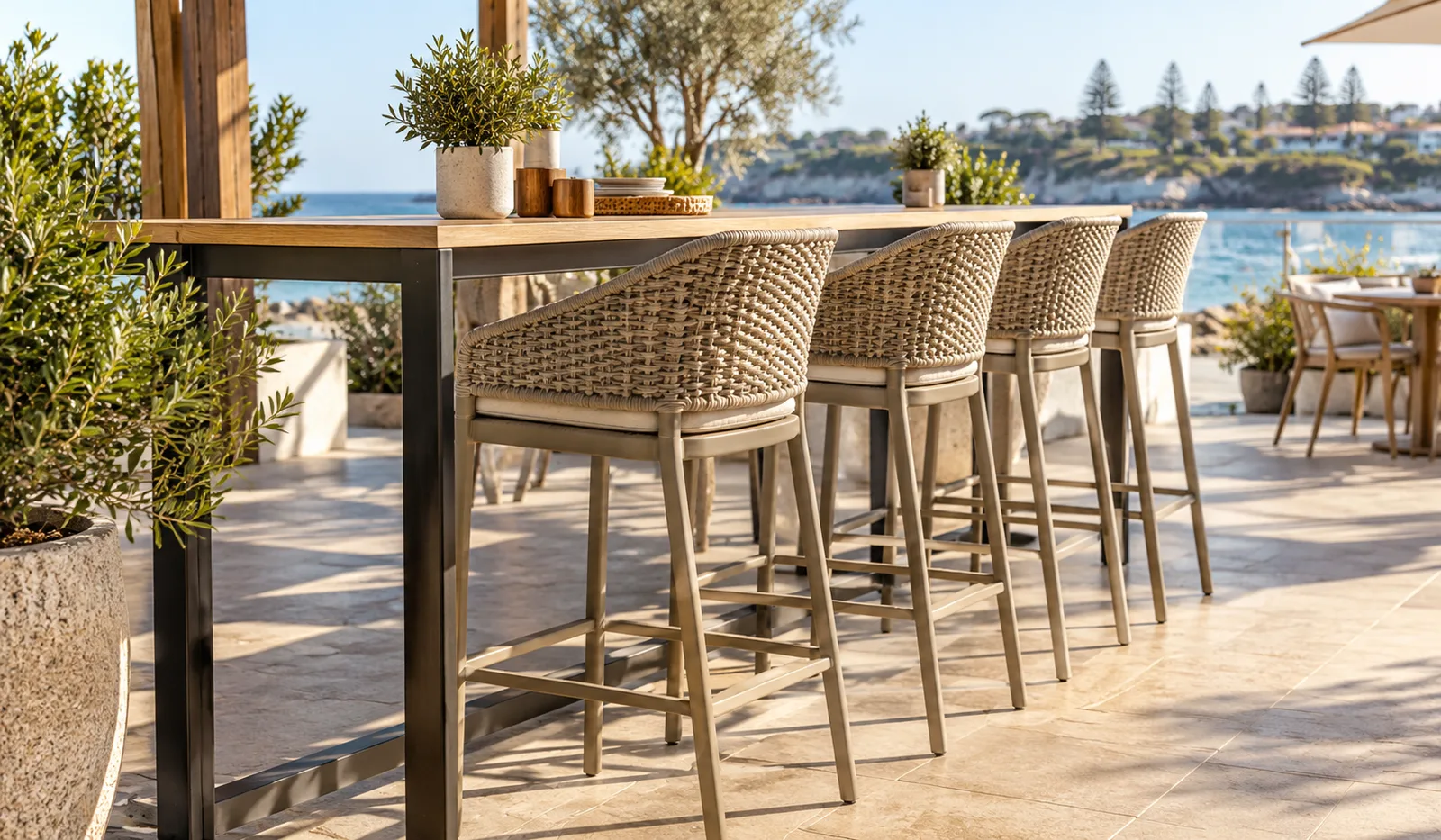 Modern outdoor bar stools arranged on a sunny café patio in Australia